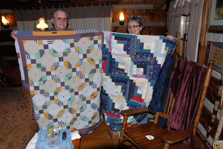 mom and dad with quilts christmas 2010